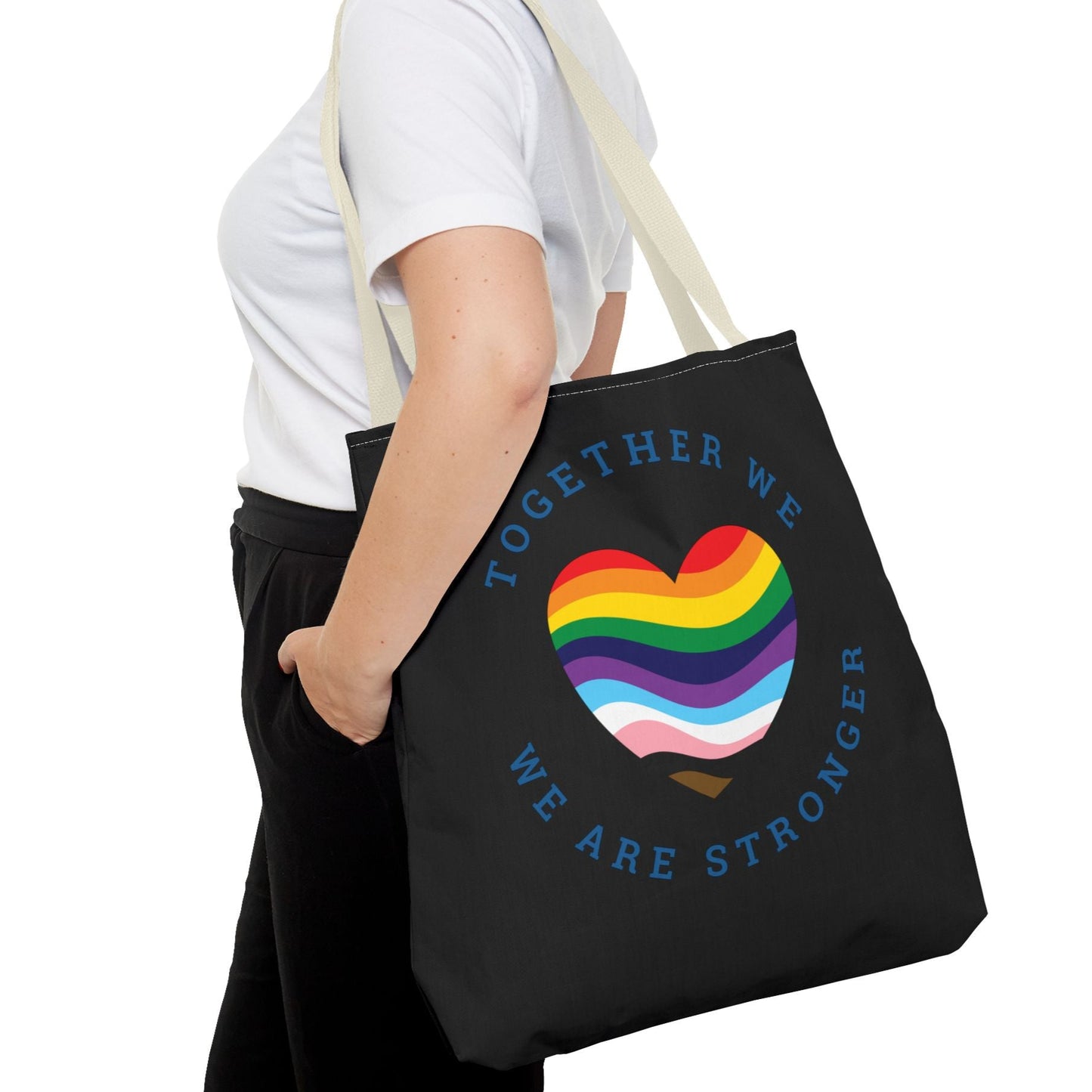 mockup of lesbian wearing TOGETHER WE ARE STRONGER | Activism Tote – Designed by Queer Energy