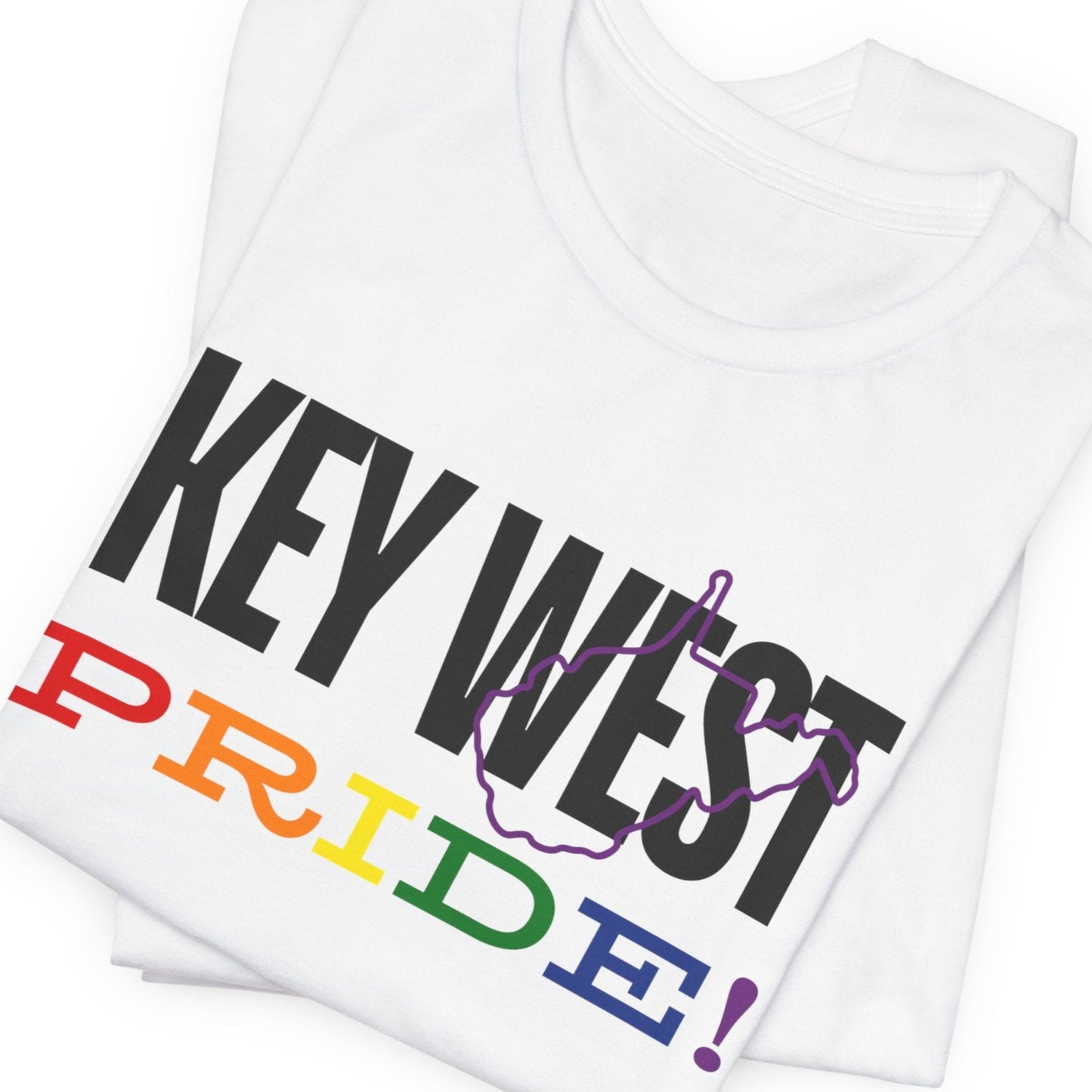 mockup of white folded Gay pride t-shirt with bold "KEY WEST PRIDE" text in rainbow colors – Designed by Queer Energy