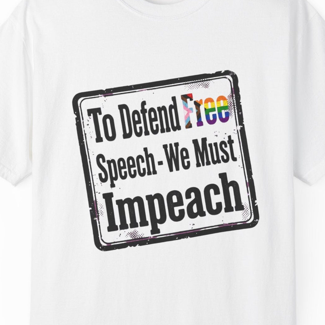 White short-sleeve crewneck t-shirt featuring a distressed black rectangular graphic with the text 'To Defend Free Speech - We Must Impeach' and the word 'Free' filled with a LGBTQ rainbow pattern.