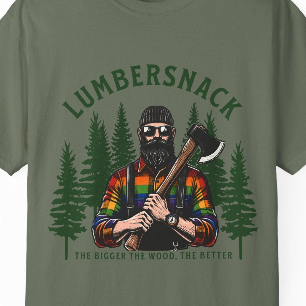 An olive green short-sleeve t-shirt with a graphic print of a lumberjack holding an axe in front of pine trees, with the text 'LUMBERSNACK' and 'THE BIGGER THE WOOD, THE BETTER' on a white background.