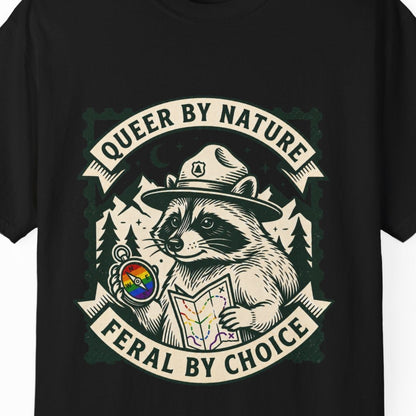 A black short-sleeve crewneck t-shirt featuring a vintage-style graphic of the raccoon Jimothy wearing a ranger hat and holding a map, surrounded by the text 'QUEER BY NATURE' and 'FERAL BY CHOICE' with a small rainbow flag detail.