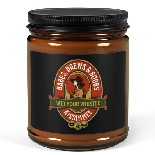 Funny lesbian candle with the phrase "BABES, BREW & BOOBS" in bold text on the label – Designed by Queer Energy