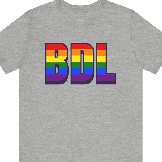Gray T-shirt that says BDL | Bradley International Airport| Queer Pride tee with the text in LGBTQ Pride rainbow colors