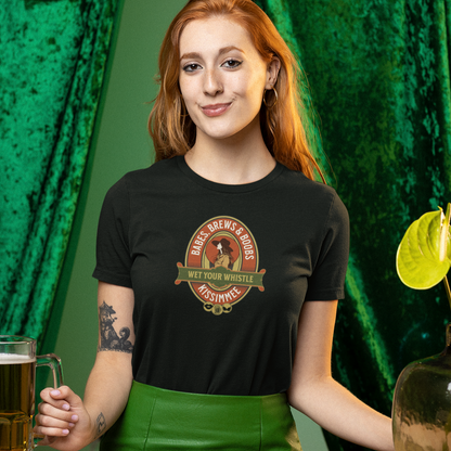 Gay pride t-shirt featuring Babes, Brews & Boobs funny lesbian design mockup of a lesbian wearing a black tee with a green background– Designed by Queer Energy 