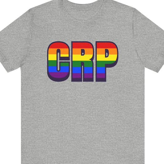 Gray T-shirt that says CRP | CRP | Corpus Christi International Airport| Pride tee with the text in Pride rainbow colors