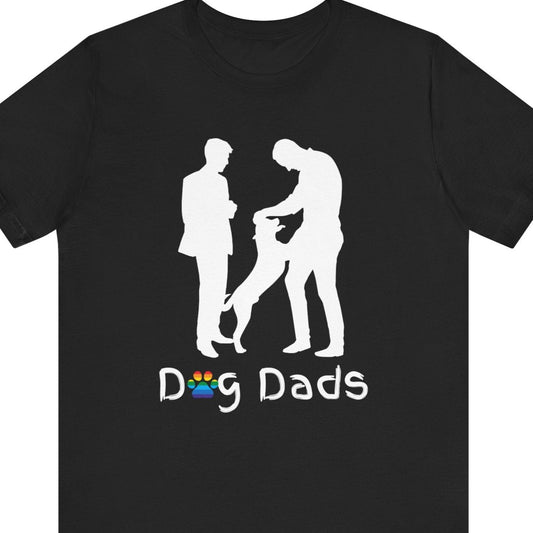 Black Tee that says “Dog Dads” with silhouette of two gay men petting their dog – Designed by Queer Energy