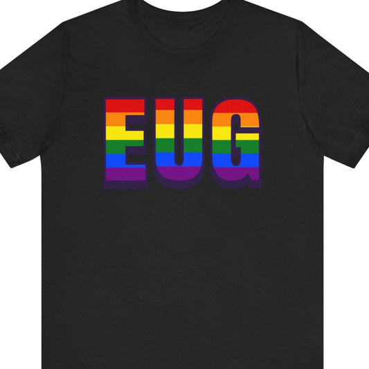 Black T-shirt that says EUG | Eugene Airport | Pride tee with the text in Pride rainbow colors
