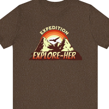 Funny lesbian tee with the bold “EXPEDITION EXPLORE-HER” design – Designed by Queer Energy in brown