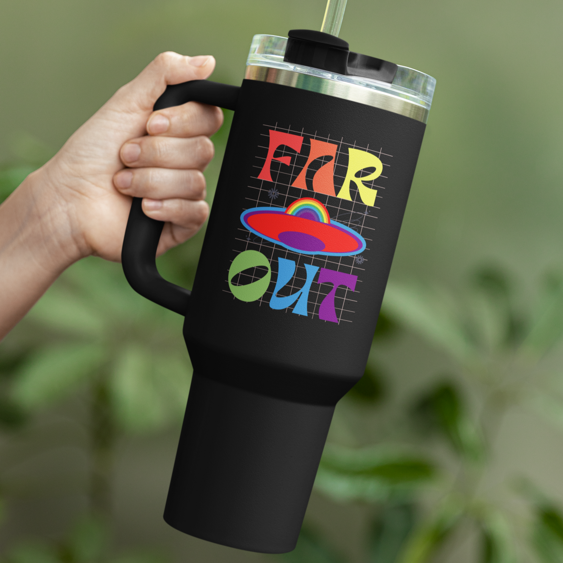 A mockup of a black colored Gay Pride Polar Camel MUG that says Far Out in rainbow colors| Pride mug designed by Queer Energy  