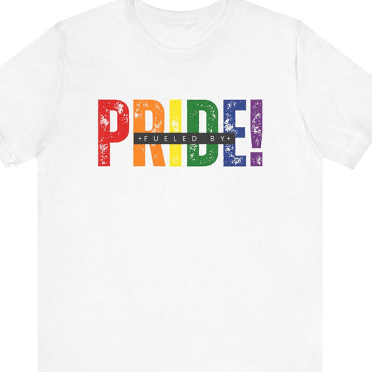 LGBTQ white tee that says “Fueled by PRIDE” in vibrant rainbow colors – Designed by Queer Energy