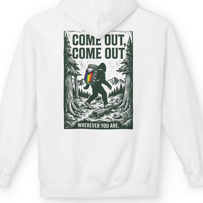 Gay pride white hoodie featuring Come Out, Come Out, Wherever You Are - Bigfoot design with Progress Pride backpack on the back by Queer Energy