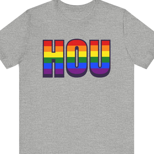 Gray T-shirt that says HOU | Houston | Pride tee with the text in Pride rainbow colors