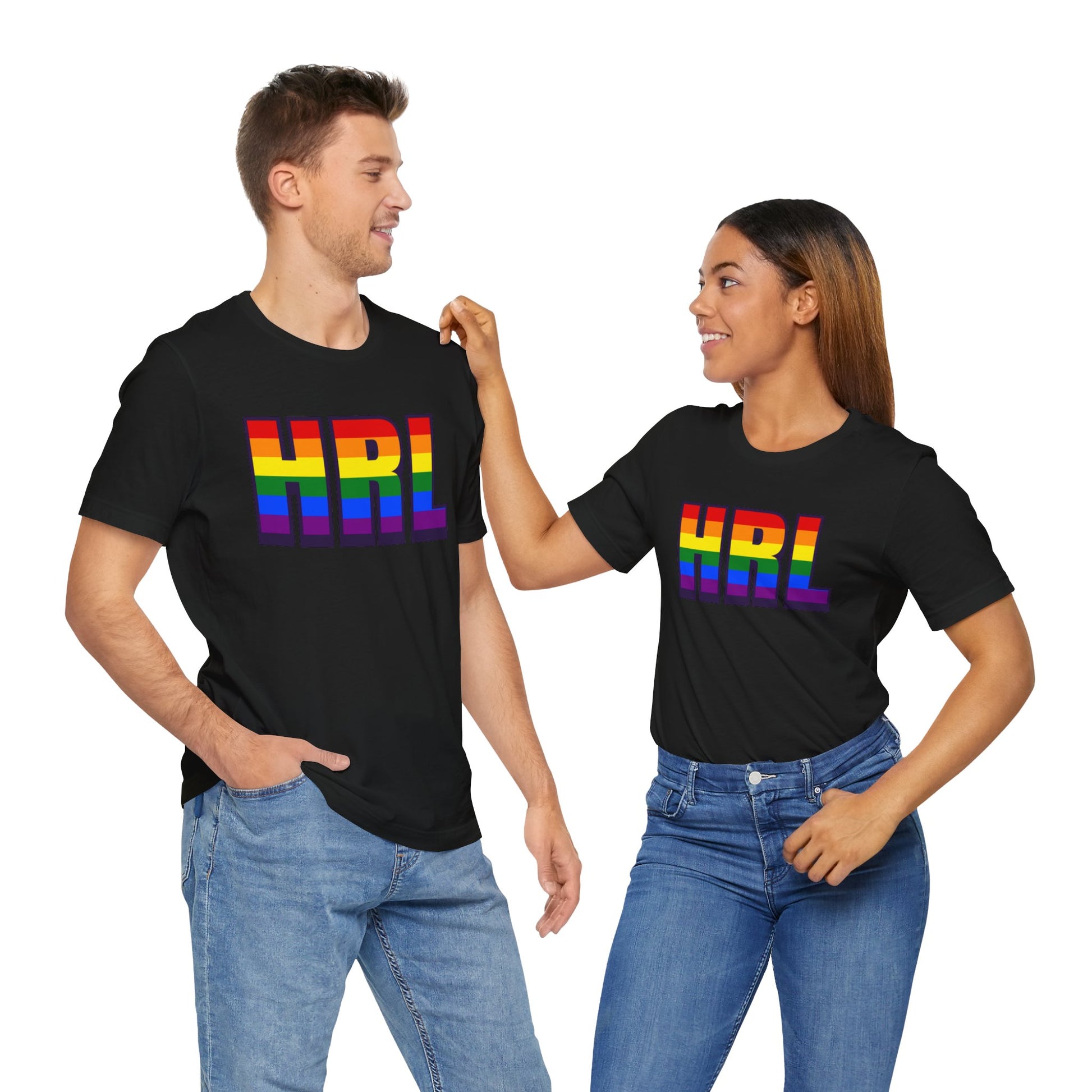 Mockup of gay people wearing Black T-shirts that says HRL | Harlingen | Pride tee with the text in Pride rainbow colors