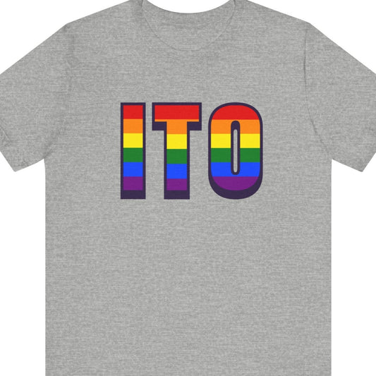 Grey T-shirt that says ITO | Hilo International Airport | with the text in Pride rainbow colors