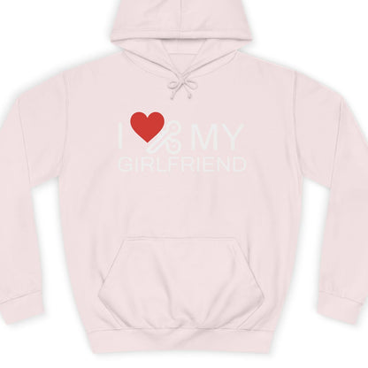 'I ❤️ MY GIRLFRIEND' text on a pink hoodie with white background