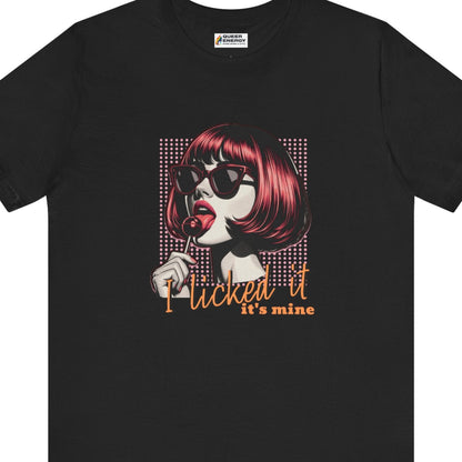 Gay pride t-shirt featuring I Licked It, It’s Mine funny sapphic design with red-haired woman licking a lollipop in rainbow colors by Queer Energy in black