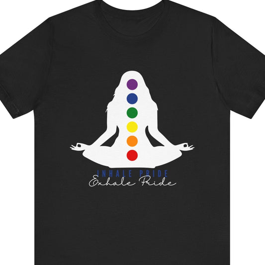 LGBTQ Pride black tee with “Inhale Pride – Exhale Pride” and a meditating woman in lotus pose with rainbow chakra dots – Designed by Queer Energy