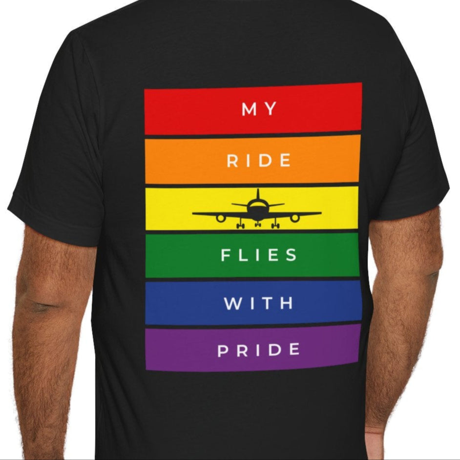 Mockup of Back of black Gay pride t-shirt that says “Airplane Mode” on the front and has an airplane with LGBTQ rainbow colors on the back – Designed by Queer Energy