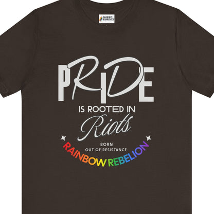 Brown Gay pride t-shirt featuring PRIDE IS ROOTED IN RIOTS – BORN OUT OF RESISTANCE – RAINBOW REBELLION design in rainbow colors by Queer Energy