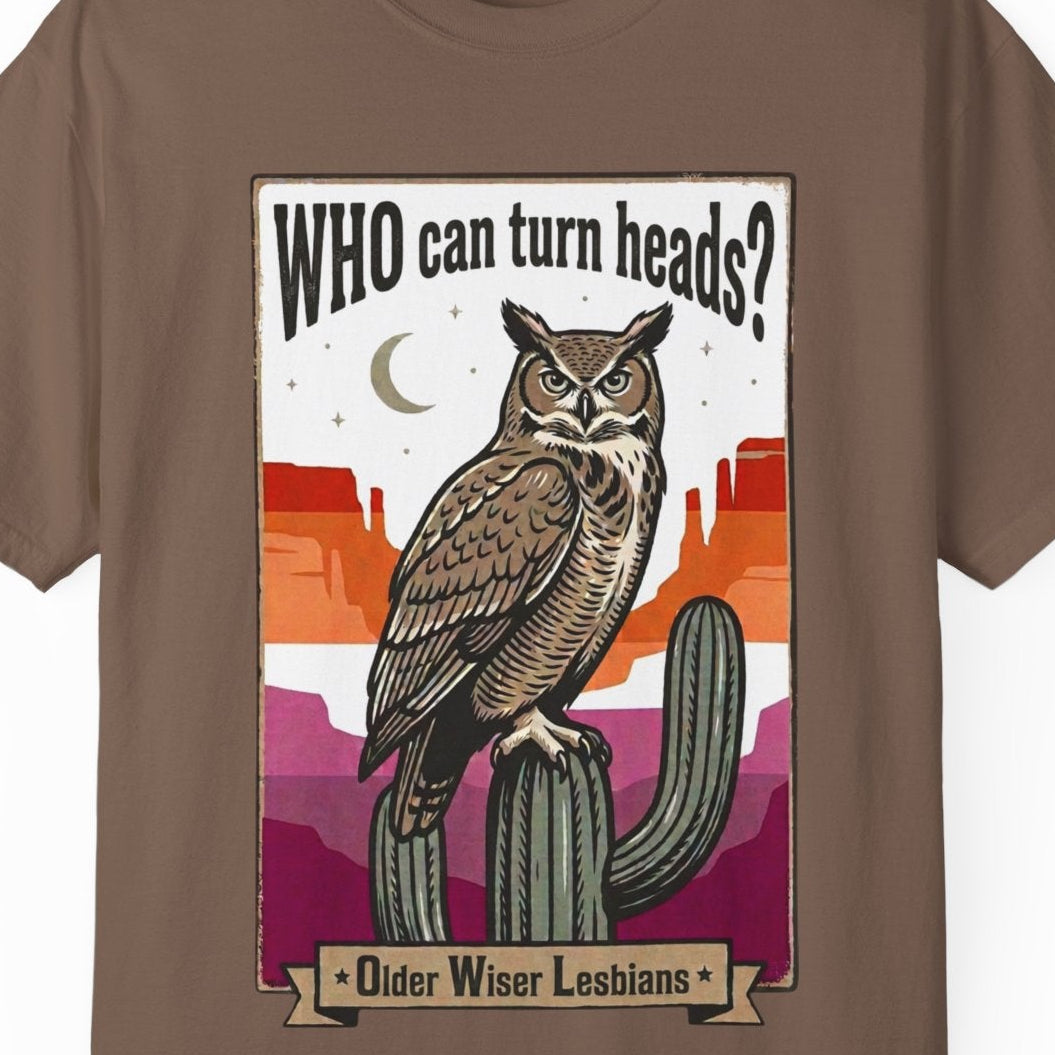 Gay pride brown tee featuring an owl with the phrase "WHO Can Turn Heads? Older Wiser Lesbians" in a vintage desert design by Queer Energy.