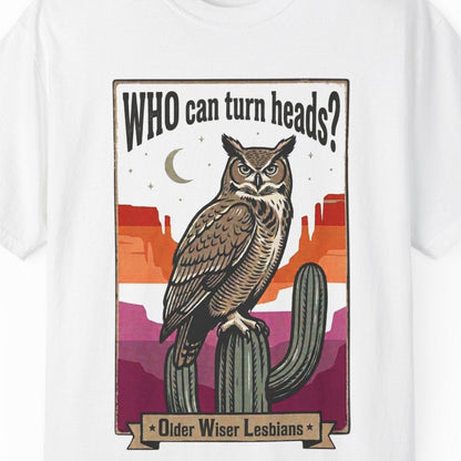 Gay pride white tee featuring an owl with the phrase "WHO Can Turn Heads? Older Wiser Lesbians" in a vintage desert design by Queer Energy.