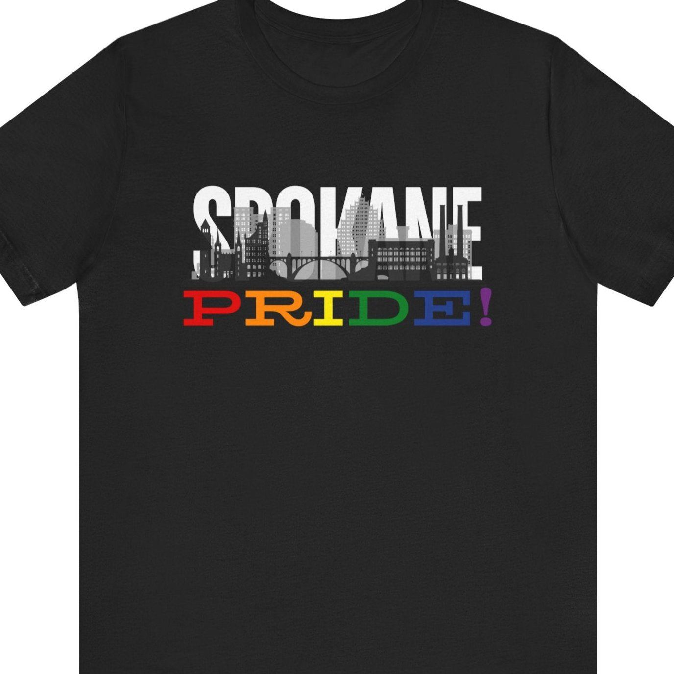 Gay pride black t-shirt featuring the Spokane skyline with rainbow accents and the clock tower– Designed by Queer Energy