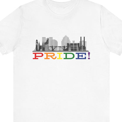 Gay pride white t-shirt featuring the Spokane skyline with rainbow accents and the Riverfront Park Clock Tower – Designed by Queer Energy