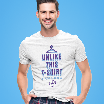 Mockup of gay man wearing a Funny gay pride tee featuring "Unlike This T-Shirt, I Am Hung" text with male symbols, designed by Queer Energy.