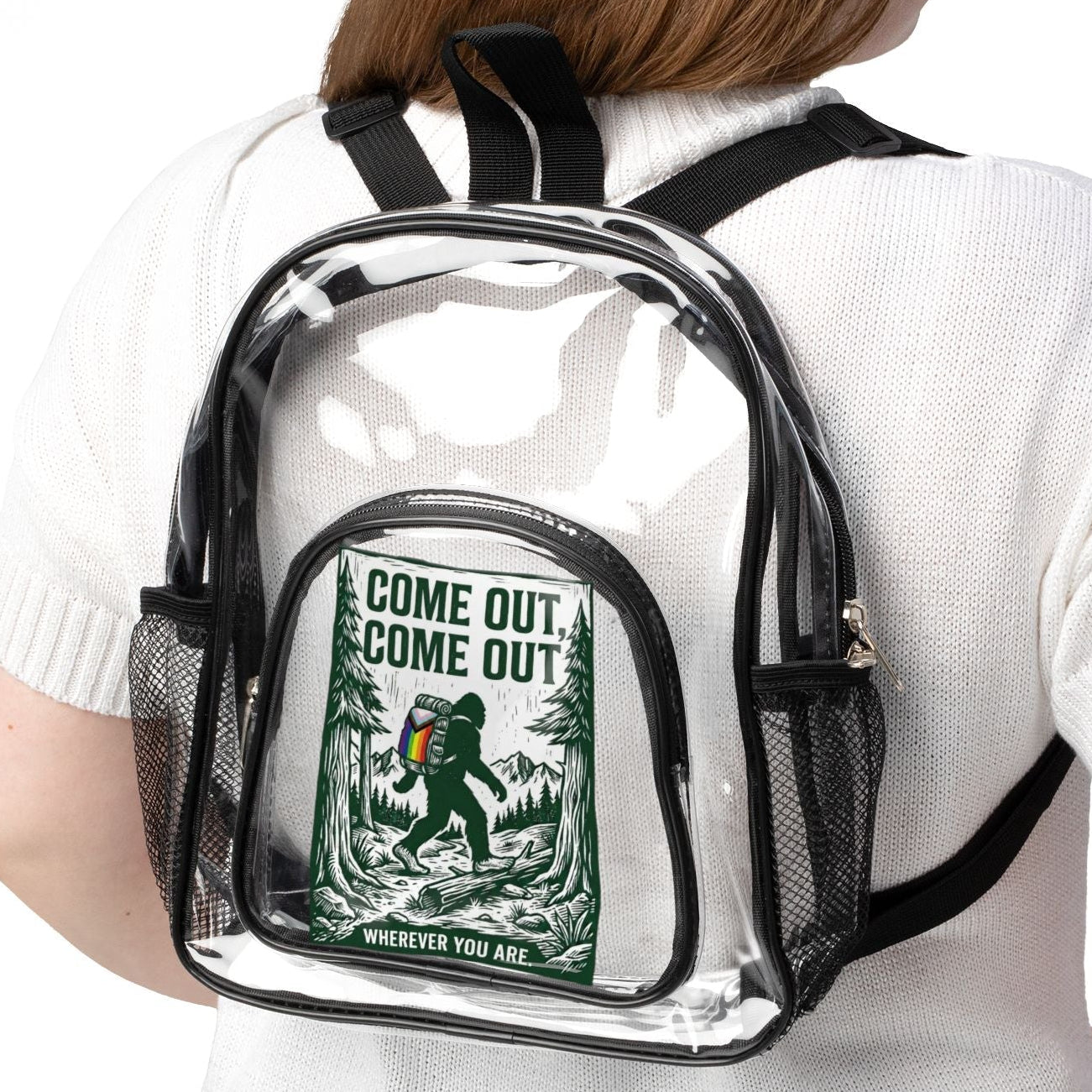 Come Out, Come Out Wherever You Are - Bigfoot | Clear Stadium Backpack wore by a Lesbian. Designed by Queer Energy - Queer Energy